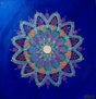 24x24 original Celebration Mandala No. 41 3D textured painting by Bala Thiagarajan, featuring iridescent colorful hand-piped dots and henna-inspired floral geometry on blue canvas.
