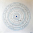 24x24 original Serene Waves 3D textured mandala painting by Bala Thiagarajan, featuring blue and white hand-piped henna-style patterns and a dichroic glass center.